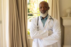portrait-of-senior-african-american-male-doctor-in-2023-11-27-05-04-17-utc (1)